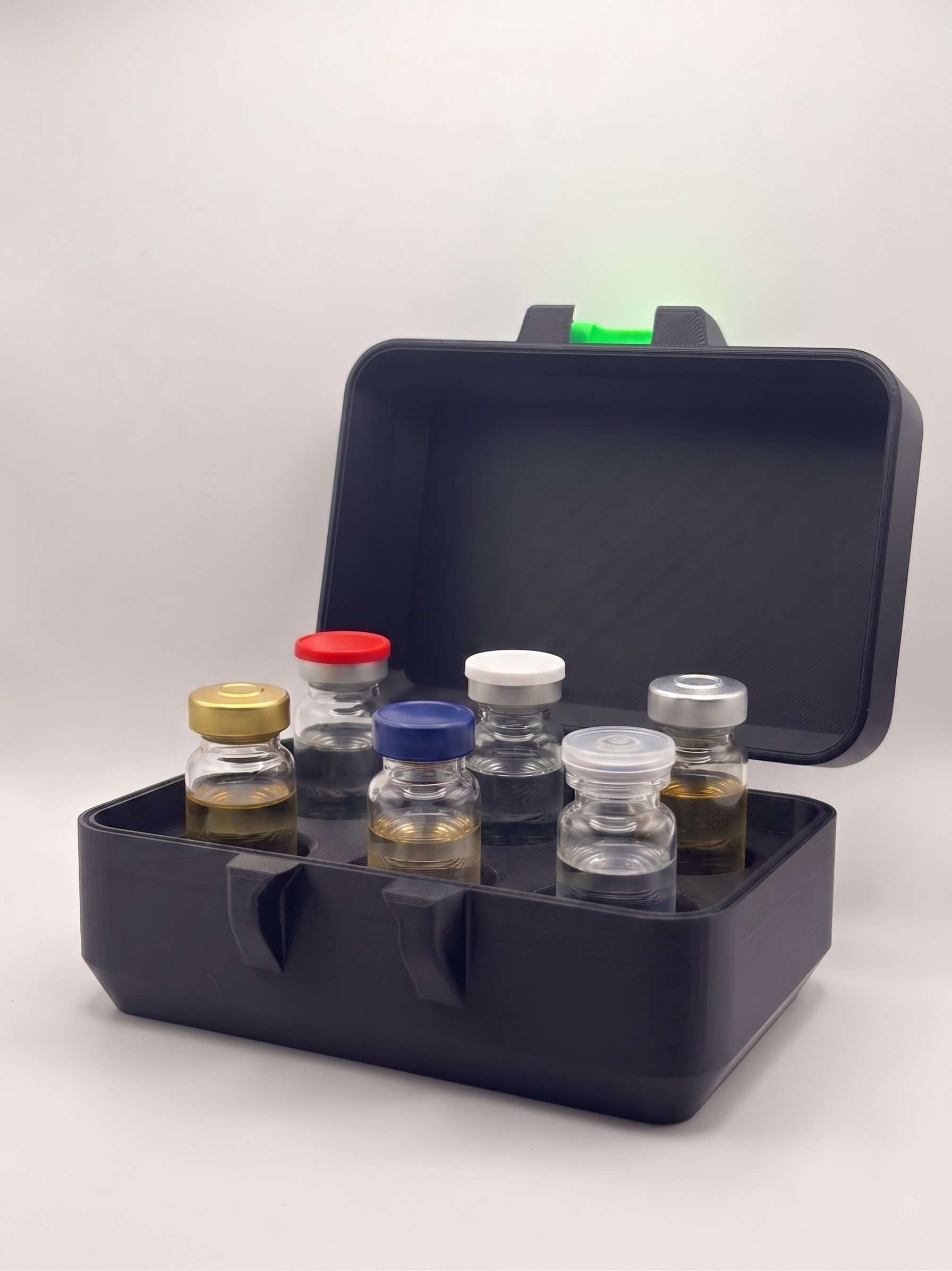 Black and green 3D printed 10ml vial holder loaded with peptide vials — The Keeper XL by Vial Buddy