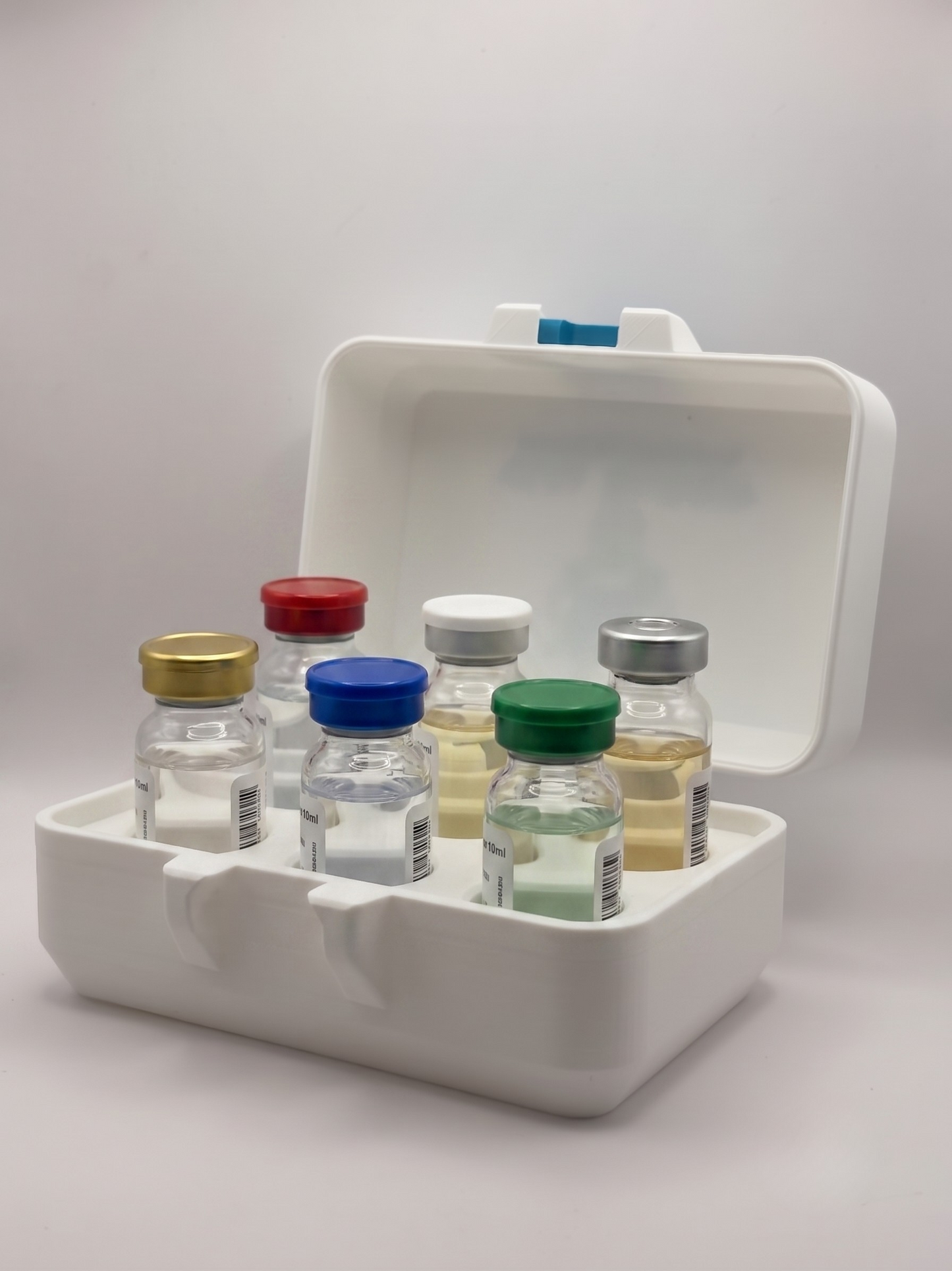 White and blue 3D printed 10ml vial holder loaded with peptide vials — The Keeper XL by Vial Buddy