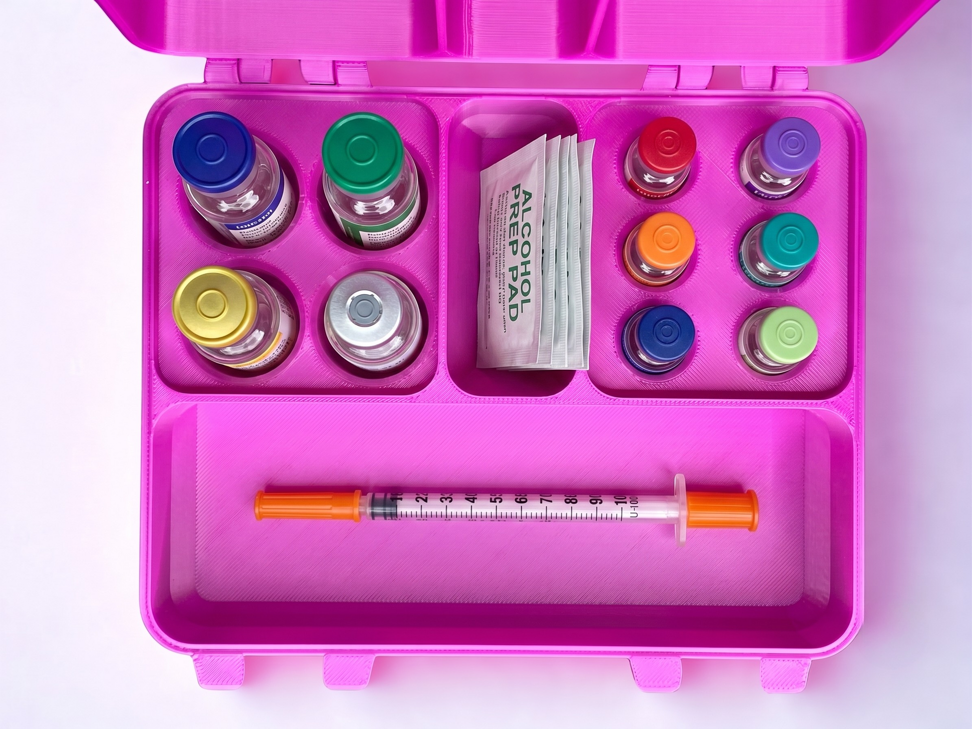 Purple and green 3D printed medium combo storage box loaded with peptide vials and syringes — The Warrior by Vial Buddy