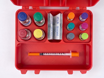 Red and blue 3D printed medium combo storage box loaded with peptide vials and syringes — The Warrior by Vial Buddy